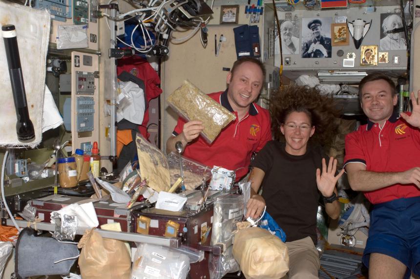 Astronauts Michael Fincke and Sandra Magnus, and cosmonaut Yury
    Lonchakov in the ISS